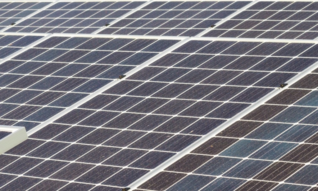Close-up of solar photovoltaic modules on distributed energy installation
